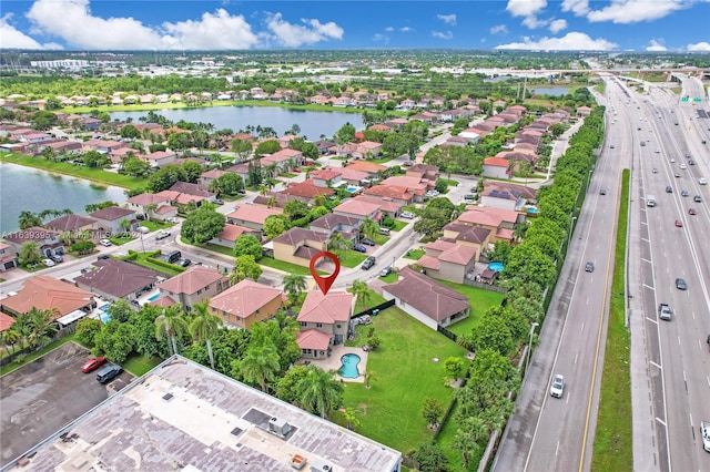 drone / aerial view featuring a water view