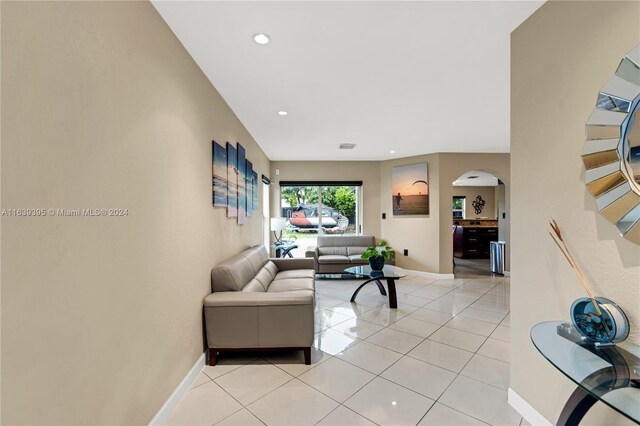 living room featuring light tile patterned floors