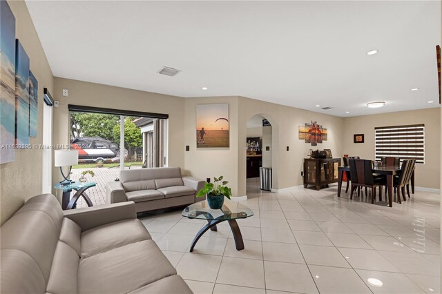 living room featuring light tile patterned floors