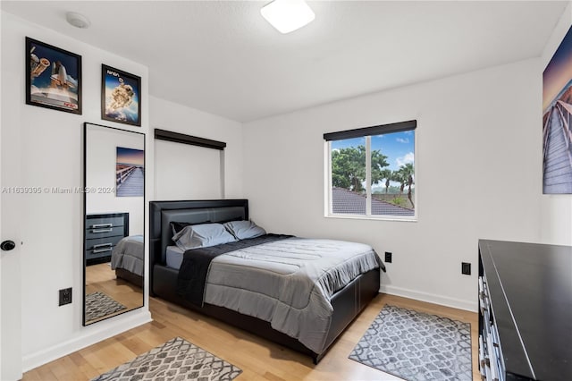 bedroom featuring light wood-type flooring