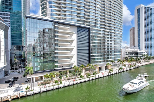 view of building exterior with a water view