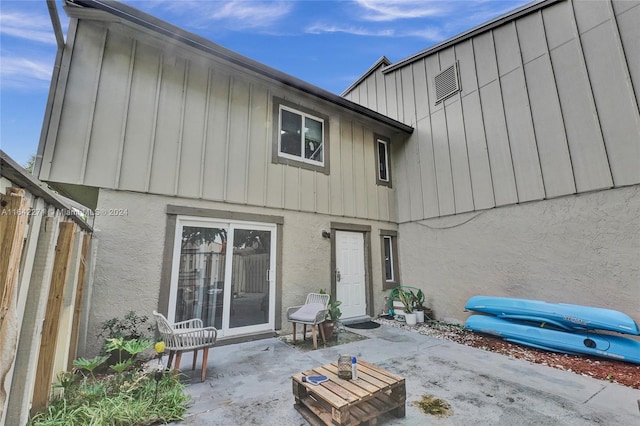 back of house featuring a patio area