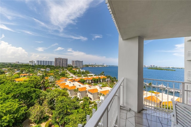 balcony featuring a water view