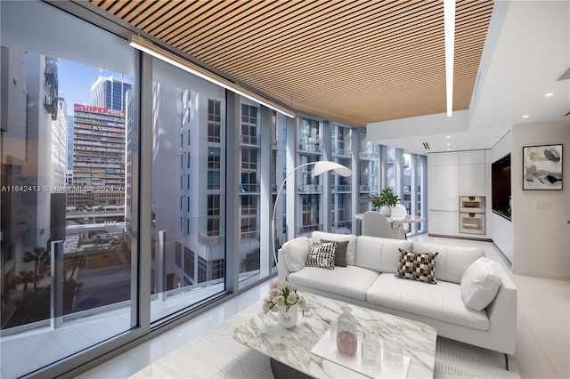 living room with a wealth of natural light and expansive windows