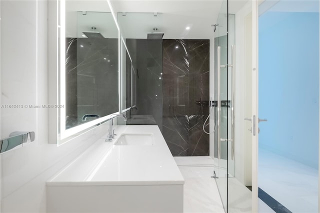 bathroom with vanity and an enclosed shower