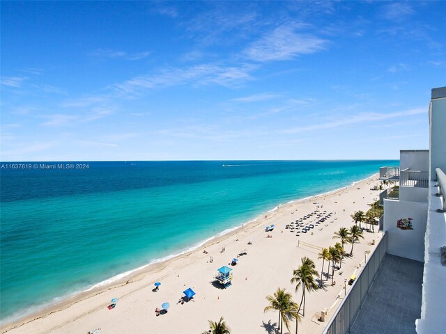 view of water feature with a beach view