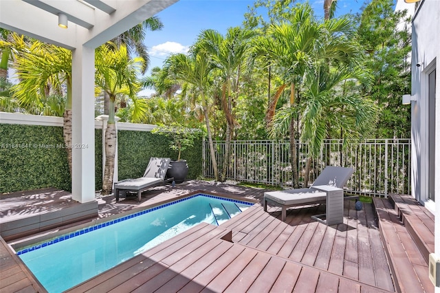 view of pool featuring a wooden deck