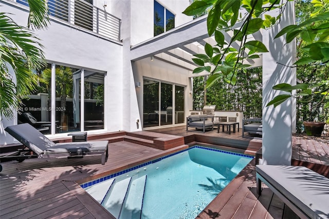 view of pool with a wooden deck