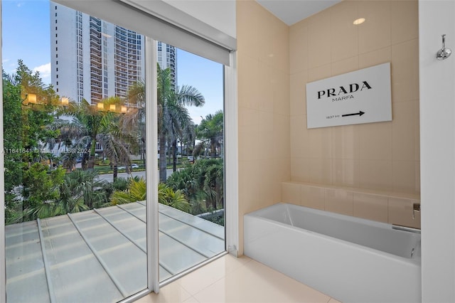 18935 Atlantic Blvd, Sunny Isles Beach, FL 33160 - bathroom with tile patterned flooring and a bath