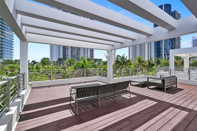18935 Atlantic Blvd, Sunny Isles Beach, FL 33160 - wooden deck with an outdoor living space