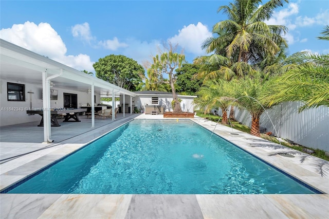 view of pool featuring a patio