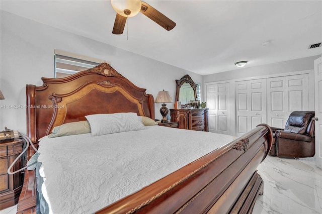 bedroom featuring a closet and ceiling fan