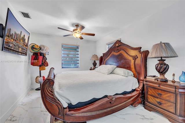 bedroom featuring ceiling fan