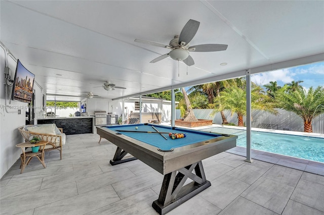 recreation room with pool table, a healthy amount of sunlight, floor to ceiling windows, and ceiling fan