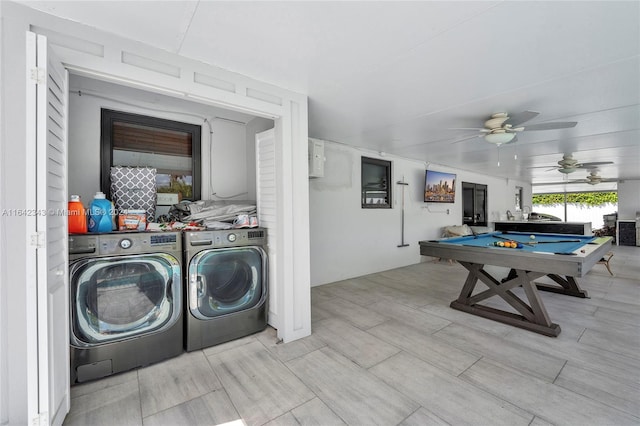 laundry room with ceiling fan, washing machine and clothes dryer, and billiards