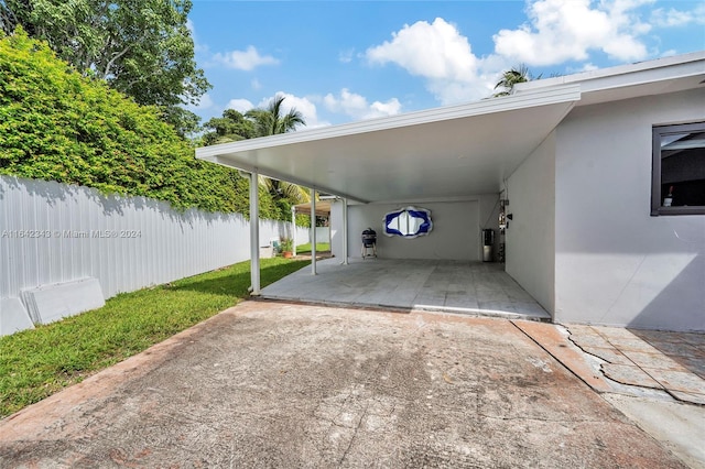 view of car parking with a carport