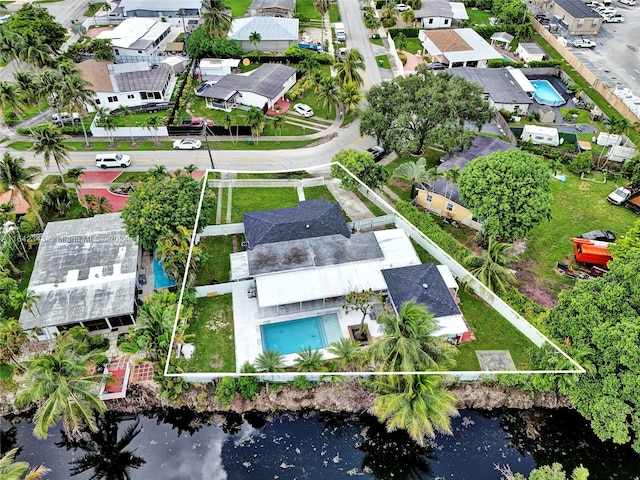 bird's eye view with a water view