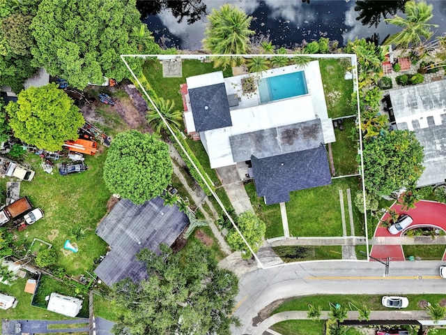 birds eye view of property featuring a water view