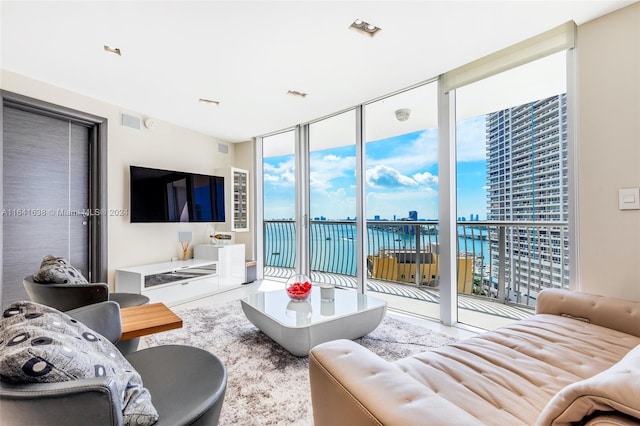 living room with floor to ceiling windows