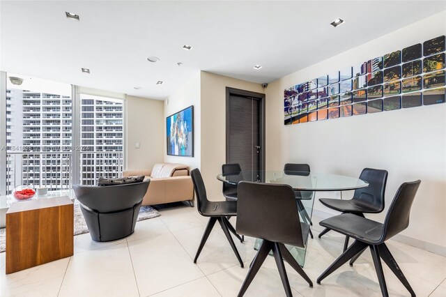 dining area with light tile patterned floors