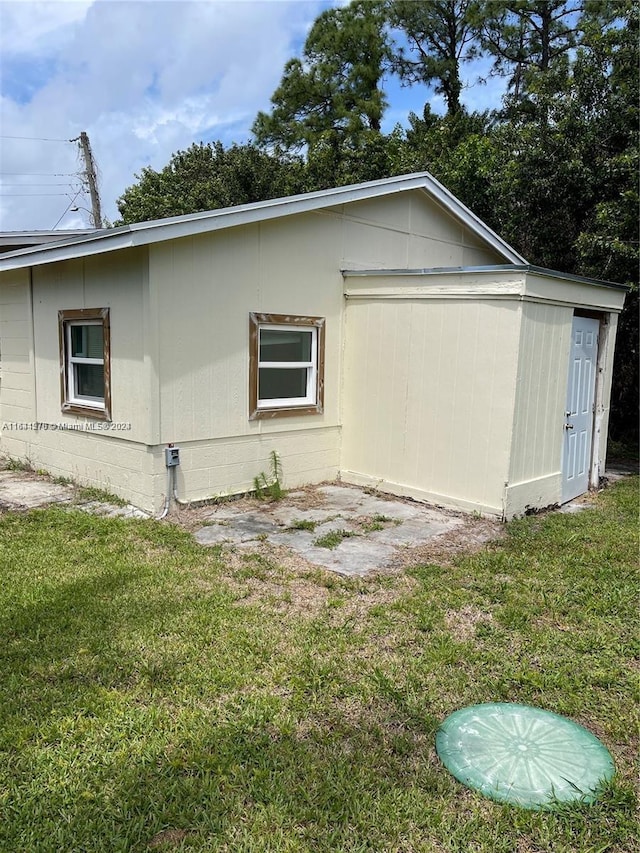 exterior space with a lawn