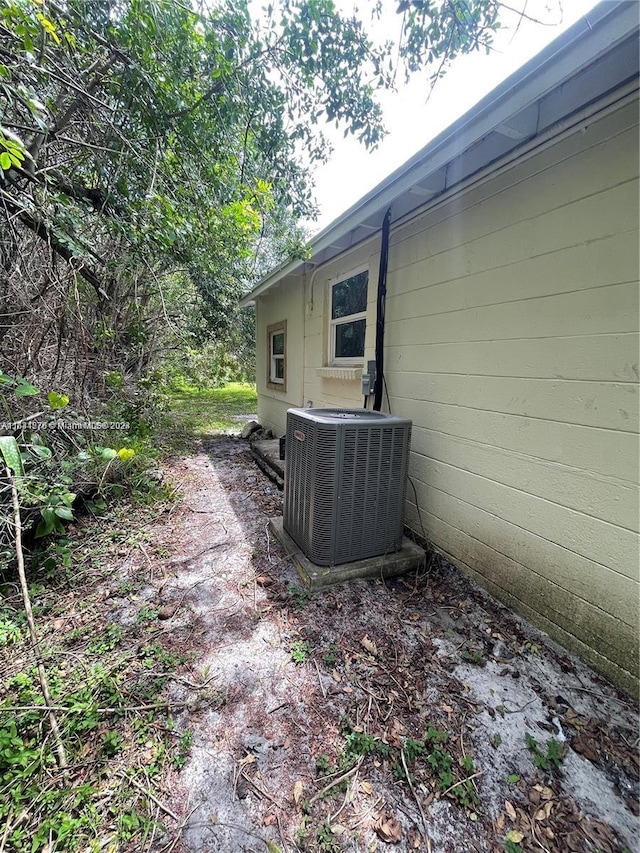 view of side of property featuring cooling unit