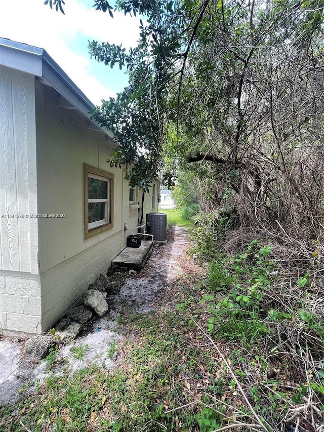 view of yard featuring central AC