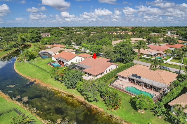 drone / aerial view featuring a water view