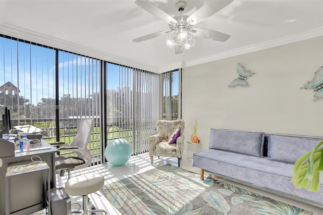 sunroom with ceiling fan