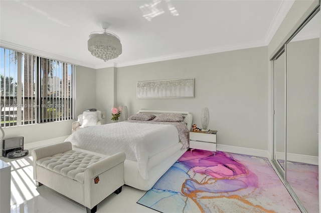 bedroom with a closet and crown molding