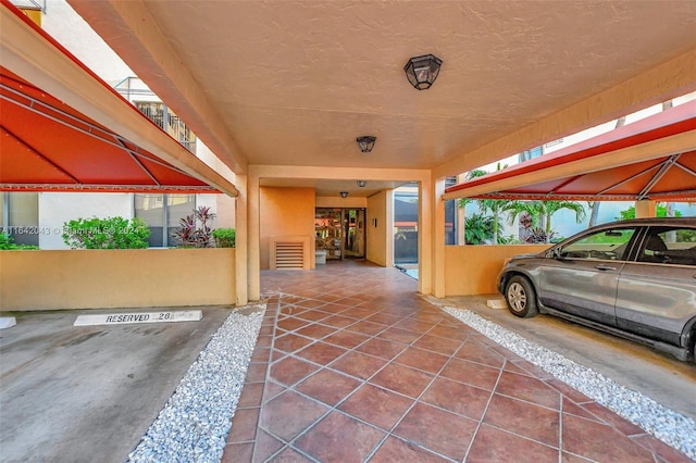 view of patio featuring a carport