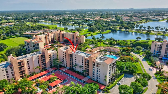 birds eye view of property featuring a water view