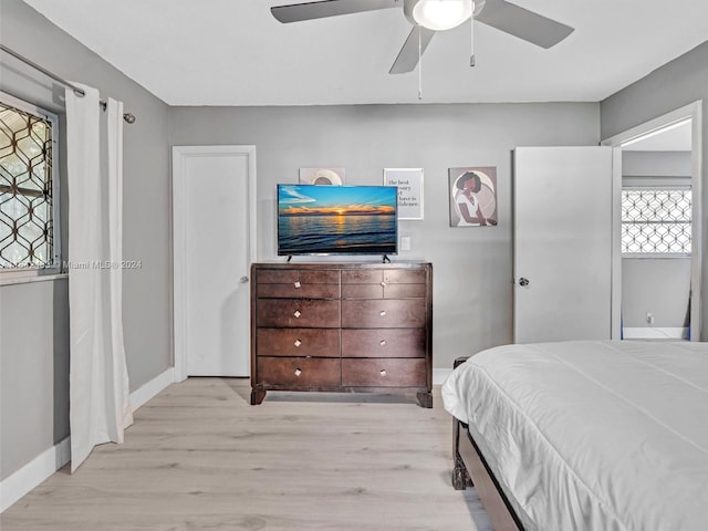 bedroom featuring ceiling fan and light wood-type flooring