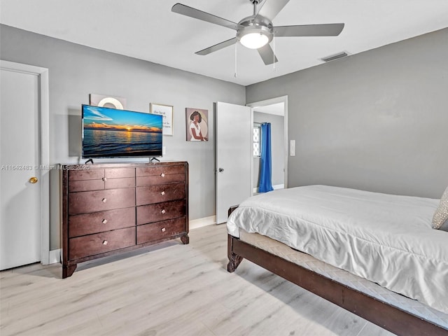 bedroom featuring light hardwood / wood-style flooring and ceiling fan