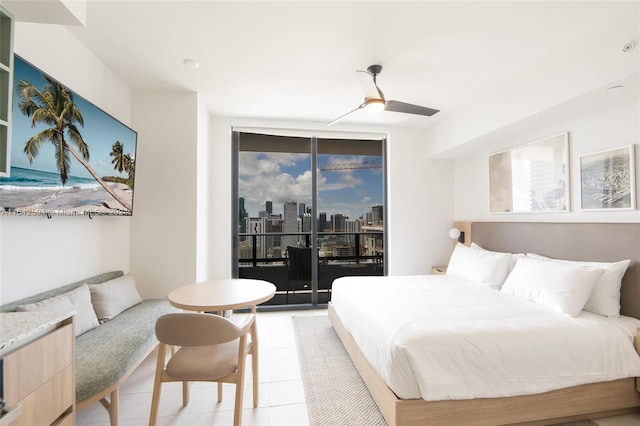 bedroom with ceiling fan, access to outside, and light tile patterned flooring