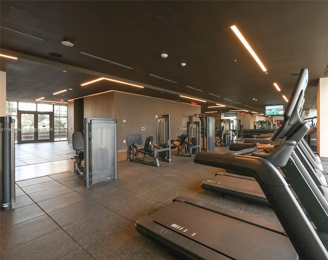 gym with tile patterned flooring