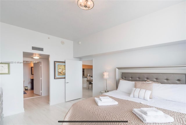 bedroom with light hardwood / wood-style flooring