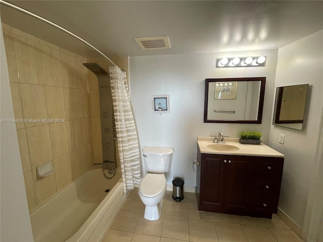 full bathroom with shower / bath combination with curtain, tile patterned flooring, vanity, and toilet