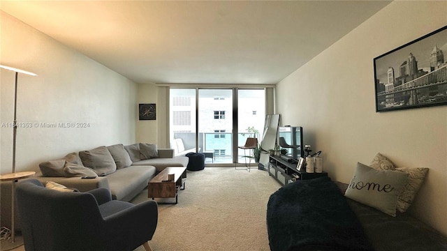 living room with carpet flooring and expansive windows