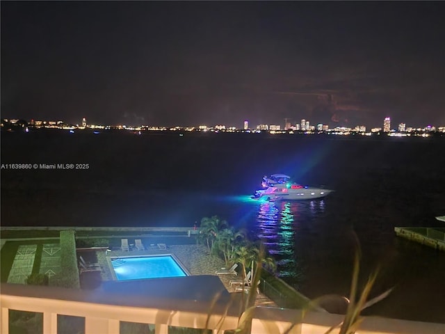 pool at twilight with a water view