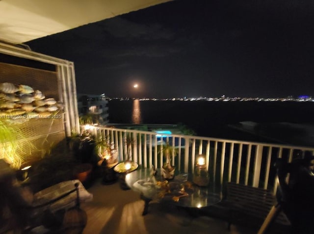 deck at twilight with a water view