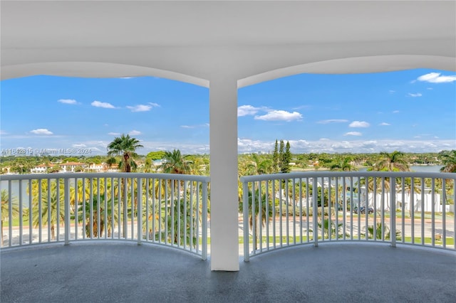 balcony featuring a water view