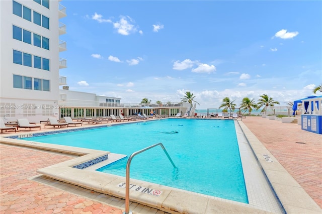 view of pool featuring a patio area