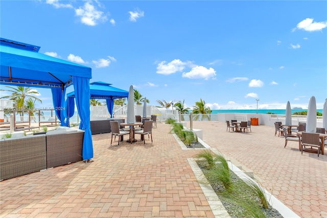 view of patio / terrace with a water view