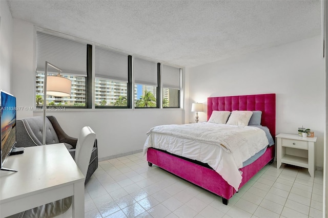 bedroom with a textured ceiling