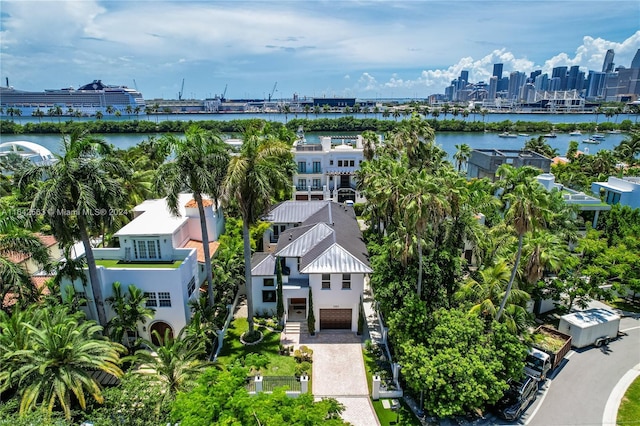 aerial view featuring a view of city and a water view