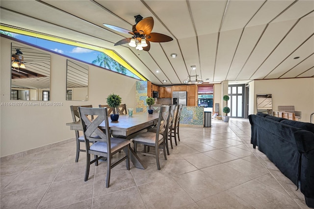 dining room with ceiling fan and light tile patterned floors