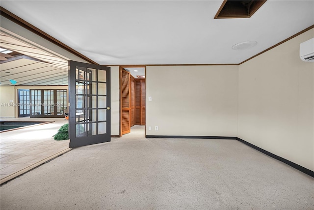 unfurnished room with ornamental molding and french doors