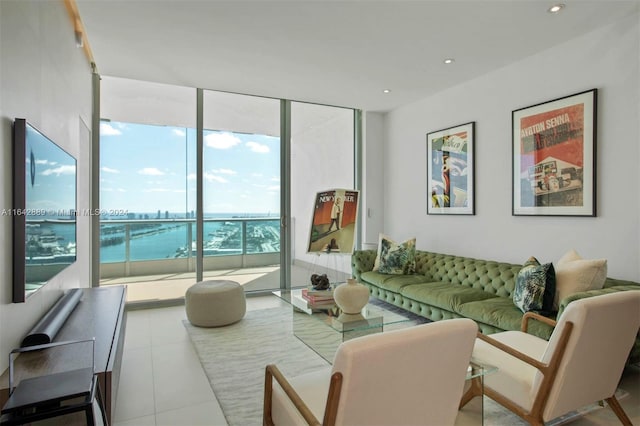 living room with tile patterned floors and expansive windows