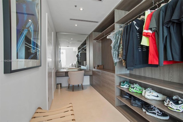 spacious closet with tile patterned flooring